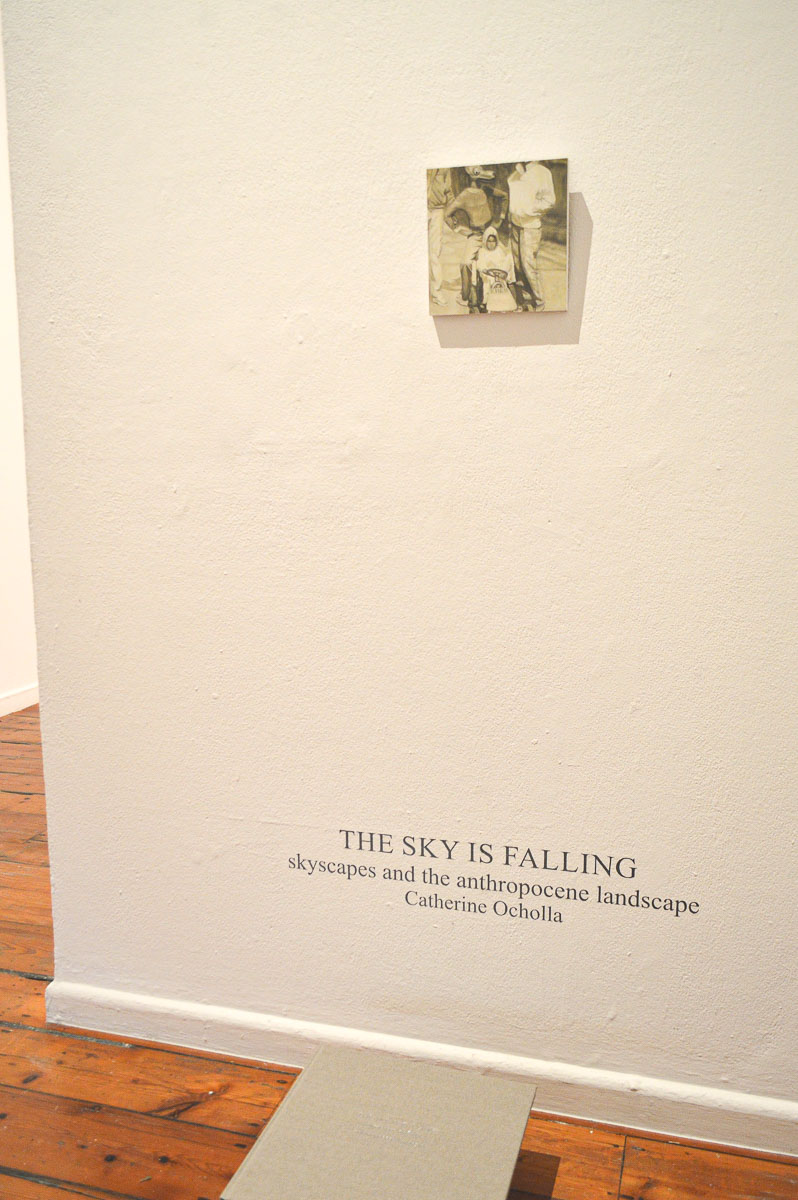 Catherine Ocholla's small sepia painting installed at the entrance to her MFA exhibition